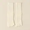 Meias de cinco dedos meias de cano médio massagem nos pés meias de algodão respiráveis absorventes de suor meias de dedos separados outono e inverno meias de cinco dedos femininas