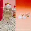 Colgante lindo de dibujos animados Labubu de oro puro 999, serie de orejas de conejo de peluche con cordón, un artículo popular en las transmisiones en vivo de Douyin para atraer clientes