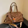 Bolso de mano retro transfronterizo para ir al trabajo, bolso de mujer de gran capacidad, nuevo bolso tote de moda de alta gama casual para viajes 2026