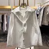 Camisa commuter fresca, holgada y adelgazante para mujer, nueva y versátil camisa casual de manga larga, primavera 2026