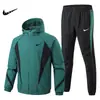 Conjunto deportivo casual de otoño nuevo transfronterizo para hombre, chaqueta fina con capucha de bloques de color de moda y pantalón, conjunto de dos piezas