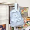 Mochila nueva estilo japonés de alta apariencia estilo universitario para mujer con estampado de estrellas, bolsa ligera de doble hombro para estudiantes de secundaria y preparatoria