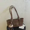 Diseño de nicho, bolso minimalista para la axila, bolso de hombro moderno y versátil para mujer, nuevo estilo 2026, bolso tipo almohada de gamuza para mujer