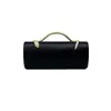 Nuevo bolso de noche de lujo ligero transfronterizo para mujer, bolso de mano cilíndrico de color liso con asa de serpiente para fiestas de cóctel y banquetes