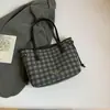 Bolso de Axila de Cuadros de Gran Capacidad de Moda Europeo y Americano para Mujer 2025 Nueva Moda Versátil Simple Bolso Tote de Hombro Único para Viajes Diarios