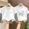 Camiseta de manga longa 100% algodão para meninas, nova para primavera e outono, camisa de base infantil, tamanho médio e grande, blusa infantil de duas peças falsas com desenho
