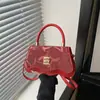 Bolso de hombro tipo axila de diseño de nicho estilo francés para mujer, popular en 2025, bolso cruzado casual elegante y único para mujer