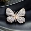 Broche de mariposa de diamantes transfronterizos europeo y americano para mujer, ramillete de insectos retro de alta gama, accesorios de aleación a juego.