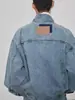 Jaqueta Jeans Curta de Algodão Tendência Outono/Inverno 2025, Lavada com Efeito Pesado Desgastado, Manga Dividida, Bolsos Múltiplos, Gola Alta, Silhueta Estilo Motociclista