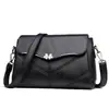 Bolsa Feminina 2026 Novo Estilo Casual para Meia-Idade Bolsa de Ombro Transversal Couro Macio Bolsa de Mãe Bolsa Feminina Fashionável Mochila Pequena Versátil