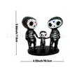 En stock explosiones transfronterizas artesanías de resina pintadas a mano estatua de pareja de calavera de caramelo familia de huesos de pareja de calavera