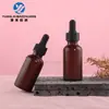 Botella de plástico marrón de 30 ml con gotero en stock, botella con gotero escala Boston, botella dispensadora de esencia, botella vacía para cuidado de la piel