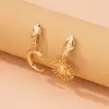 Pendientes divertidos de metal con diseño creativo europeo y americano de Palma sol luna personalidad asimétricos exagerados moda pendientes femeninos Cruz