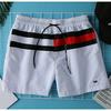 Shorts de correspondência de cores estilo europeu e americano dos homens tendência da moda lazer calças esportivas de três pontos casa ao ar livre calças de praia de borracha primavera e verão