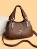 Bolsa de alta qualidade e elegante para mulheres, coleção outono/inverno 2026, com design simples, múltiplos compartimentos, e pode ser carregada na mão ou usada como bolsa de ombro ou bolsa transversal.