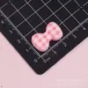 Accesorio de resina con lazo a cuadros multicolor brillante, llavero DIY con pegamento cremoso, pasador, material para accesorios para el cabello