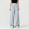 Pantalones deportivos de chándal versátiles de moda para mujer, talla grande, estilo americano de otoño, pantalones grises de pierna ancha, pantalones casuales fluidos para jóvenes, modernos