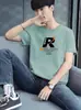 Venda Direta da Fábrica Camiseta de Manga Curta para Homem, Nova Tendência de Verão Marca Moda Camiseta de Cinco Mangas com Estampa de Letras, Gola Redonda Camiseta Versátil