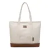 Bolsa de lona gruesa, simple, de gran capacidad 2026 nueva moda, bolso de mano y bolso de hombro versátil para ir al trabajo para niñas