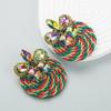 Aretes de moda europea y americana con personalidad geométrica de aleación con incrustaciones de diamantes de vidrio tejido con alambre elástico de poliéster de alta gama