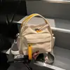 Bolsa Pequena Versátil Leve Casual Estilo Japonês 2026 Verão Nova Bolsa de Ombro Transversal de Lona Bolsa de Mão para Itens Diversos do Dia a Dia