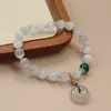 Pulsera de Ópalo nuevo estilo chino elegante estilo nacional pulsera de moda flor de loto hebilla de seguridad pulsera de estilo literario versátil venta al por mayor