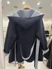 Nuevo Abrigo de Lana de Doble Cara de Color Contrastante para Otoño e Invierno 2025 Chaqueta Albornoz Suelta de Lana con Capucha Ajustada Ropa Femenina Transfronteriza
