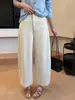 Jeans de cintura alta, perna larga, corte curvo tridimensional, com cós semi-elástico atrás, toque semelhante ao algodão, estilo balloon, comprimento cropped, modelador e versátil, novidade para 2026