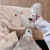 Pijama lindo con estampado de pastel y cuello de muñeca para mujer, Nuevo estilo Primavera y Otoño 2026, Se puede usar afuera, Conjunto para estar en casa con un toque de alta gama