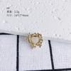 Accesorios de joyería DIY al por mayor, colgante de aleación con incrustaciones de perla en forma de corazón, collar y pendientes, colgante de joyería