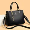Bolso de Mujer 2026 Nueva Moda Bolso de Mano de Negocios Transfronterizo Retro de Gama Alta Versátil para Viajar con Múltiples Compartimentos Bolso de Hombro