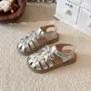 Sandalias tejidas de punta cerrada para niñas 2026 Verano Nueva Moda Estilo Coreano Zapatos de Princesa para Niños y Niñas Suela Suave Zapatos de Playa