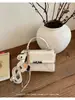 Bolso Pequeño Elegante de Alta Gama con Textura para Mujer 2026 Nueva Moda Bolso Cruzado Versátil Bolso de Mano Exquisito Súper Moderno Bolso Cuadrado Pequeño