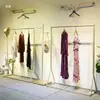 Estante de exhibición para tienda de ropa de pie para vestido de novia vestido de noche estante dorado para ropa estilo ins perchero para tienda de ropa de mujer