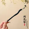 Novo grampo de cabelo de madeira retrô estilo chinês, nicho e simples, acessório de cabelo versátil com borlas da moda e design elegante