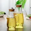Atacado de fábrica utensílio doméstico de cozinha de vidro para temperos garrafa de óleo Bico de águia à prova de vazamento Óleo de vidro borossilicato alto com escala