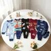 Ropa interior para niños europea y americana, Ropa para niños de primavera, otoño e invierno, Ropa para el hogar, Conjunto de dinosaurios para niños y niñas, Pijama de dos piezas al por mayor