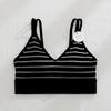 Primavera y verano Nuevo costilla hermosa espalda envuelta pecho ropa interior sujetador de mujer sin aro de acero fijo copa fina pecho pequeño base
