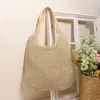 Bolso de hombro tejido para mujer, nuevo bolso tote de paja calado primavera/verano, bolsa de playa de gran capacidad para vacaciones, bolso de ganchillo hecho a mano