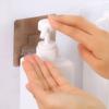 Colgador de pared mágico cepillado para gel de ducha, champú, desinfectante de manos, tipo ventosa, gancho de fábrica sin costuras