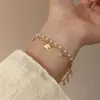 Collar de Perlas Mariposa Doble Capa Estilo Deseo Puro para Mujer 2025 Nuevo Collar Accesorios Lujo Ligero Nicho Apilamiento Cadena Clavícula