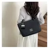 Elegante bolso de mano retro para mujer, nuevo bolso cruzado versátil de moda 2026, bolso de mano para el trabajo, bolso tipo cubo, bolso de axila