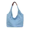 Bolsa tote casual estilo coreano para mulheres 2026 nova bolsa transfronteiriça de grande capacidade para ombro ou axila bolsa versátil para o dia a dia para estudantes