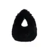 Bolsa de Pelo Plush Feminina Outono Inverno 2026 Nova Casual Nicho Design Moda Bolsa de Mão de Pelo Bolsa Pequena para Levar para o Trabalho