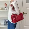 Bolso de mujer de gran capacidad 2026 nuevo bolso de hombro casual de nicho vintage con un toque de alta gama para el trabajo y los desplazamientos, bolso tipo almohada