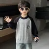 Suéter para Niños Otoño Invierno 2026 Estilo Nuevo Cuello Redondo de Punto Base Invierno Capa Interior para Niños Pequeños Tejido de Punto Espeso