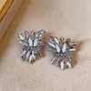 Pendientes de Botón Irregulares de Fuegos Artificiales Incrustados con Diamantes Europeos y Americanos Aguja de Plata Pendientes de Diseño Exagerado de Nicho Temperamento Accesorios de Pendientes de Lujo Ligero de Alta Gama