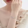 Pulseira de Aço Titânio com Trevo de Quatro Folhas em Toda a Peça para Meninas, Corda Vermelha, Joia de Mão Leve e Exquisita, de Luxo, Não Desbota, Venda Quente Transfronteiriça