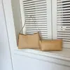 Bolso de hombro tejido con patrón fresco transfronterizo, moderno 2026 elegante bolso para madre e hija, bolso de axila diario de comercio exterior para commuting
