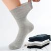 Nuevos calcetines de algodón holgados para hombre de Otoño e Invierno color liso doble costura calcetines para hombre transpirables absorbentes de sudor calcetines de masaje suela venta directa de fábrica